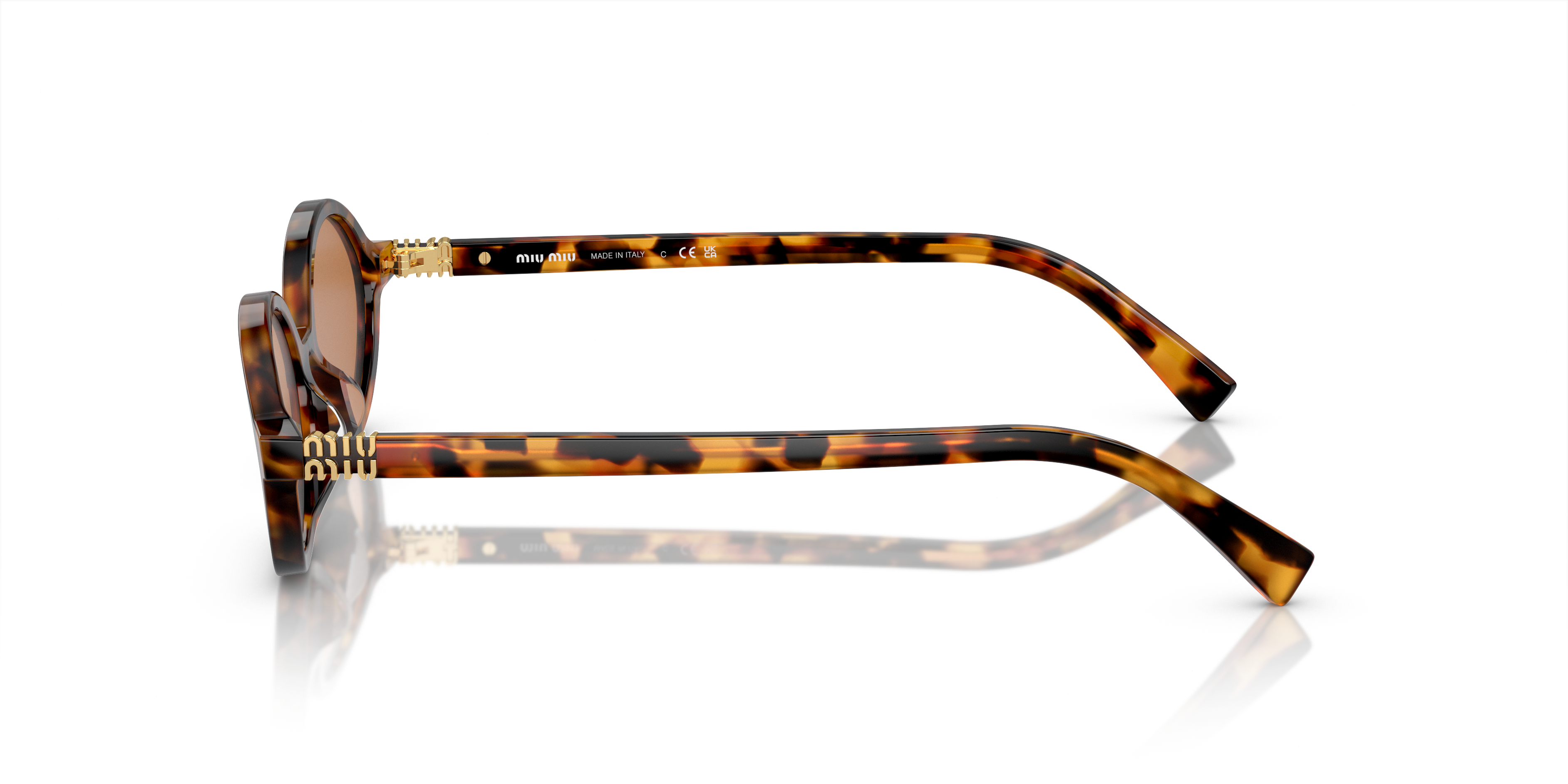 Miu Miu MU 04ZS 19P2Z1 Light Havana Sunglasses for Woman Miu Miu MU 04ZS 19P2Z1 Light Havana Sunglasses for Woman
